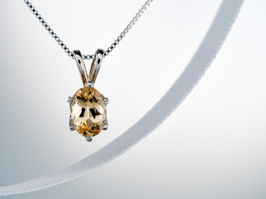 Authentic precious topaz pendant necklace. Ouro Preto, Brazil origin. 6x4mm oval Imperial Topaz. Sterling silver pendant.