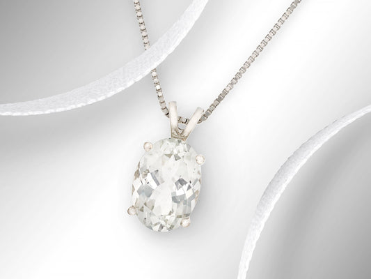 Magnificent white topaz gemstone pendant necklace. 14x10mm natural oval faceted Brazilian gemstone. 6.85ctw gem.