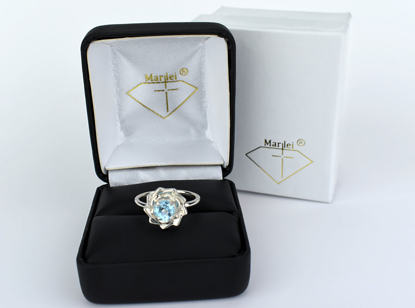 Sky Blue Lotus Flower Ring. Natural, 5mm Light Blue Topaz gemstone set in handmade premium silver ring.