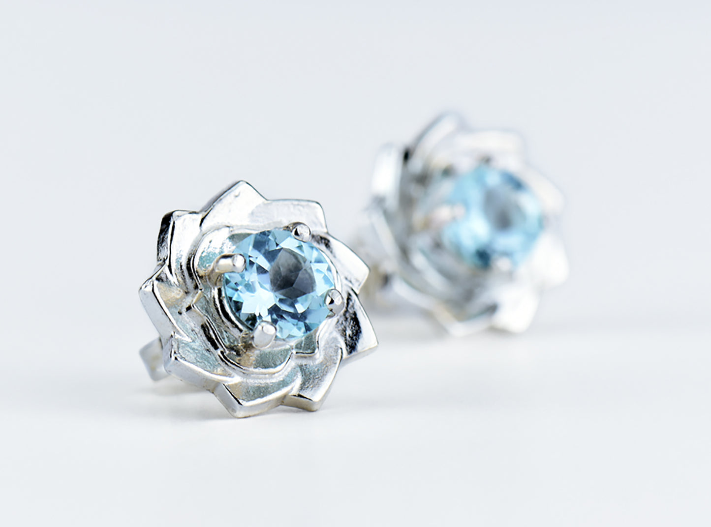 Light blue lotus flower collection.  Matching Sky Blue Topaz Jewelry.