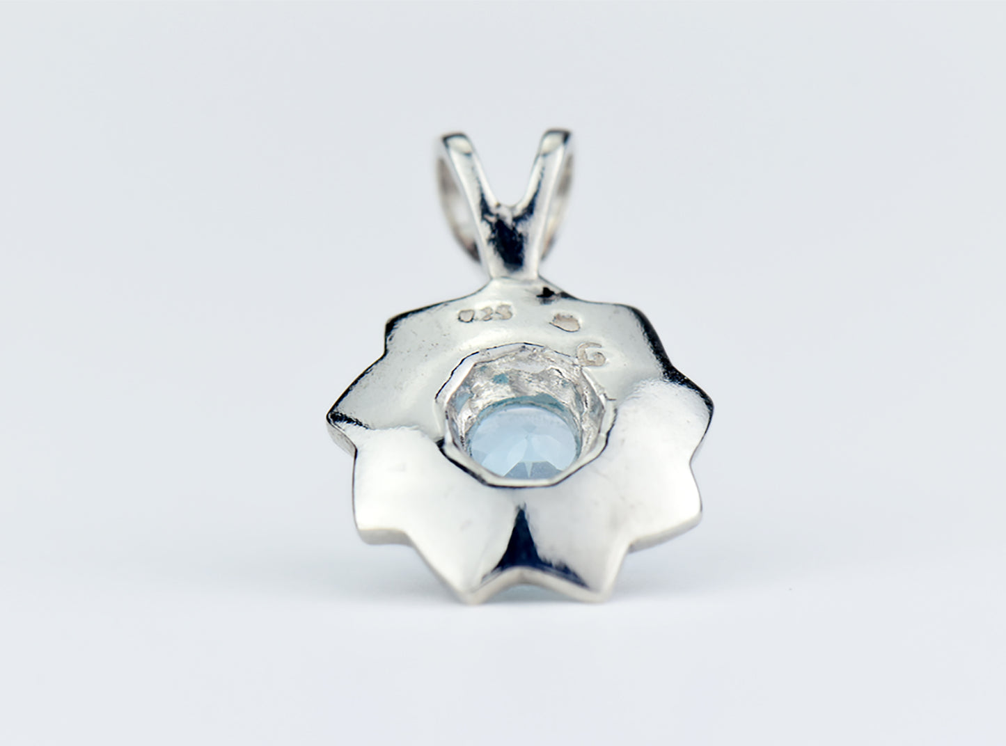 Light Blue Lotus Flower Pendant Necklace. Natural, Sky Blue Topaz gemstone set in handmade premium silver flower pendant.