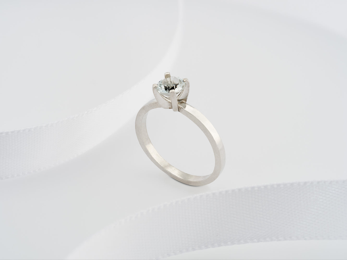 White Topaz Solitaire Ring. Premium Sterling Silver. Round, Diamond Cut, Natural Topaz from Brazil.Classic 5mm, .59 ctw,