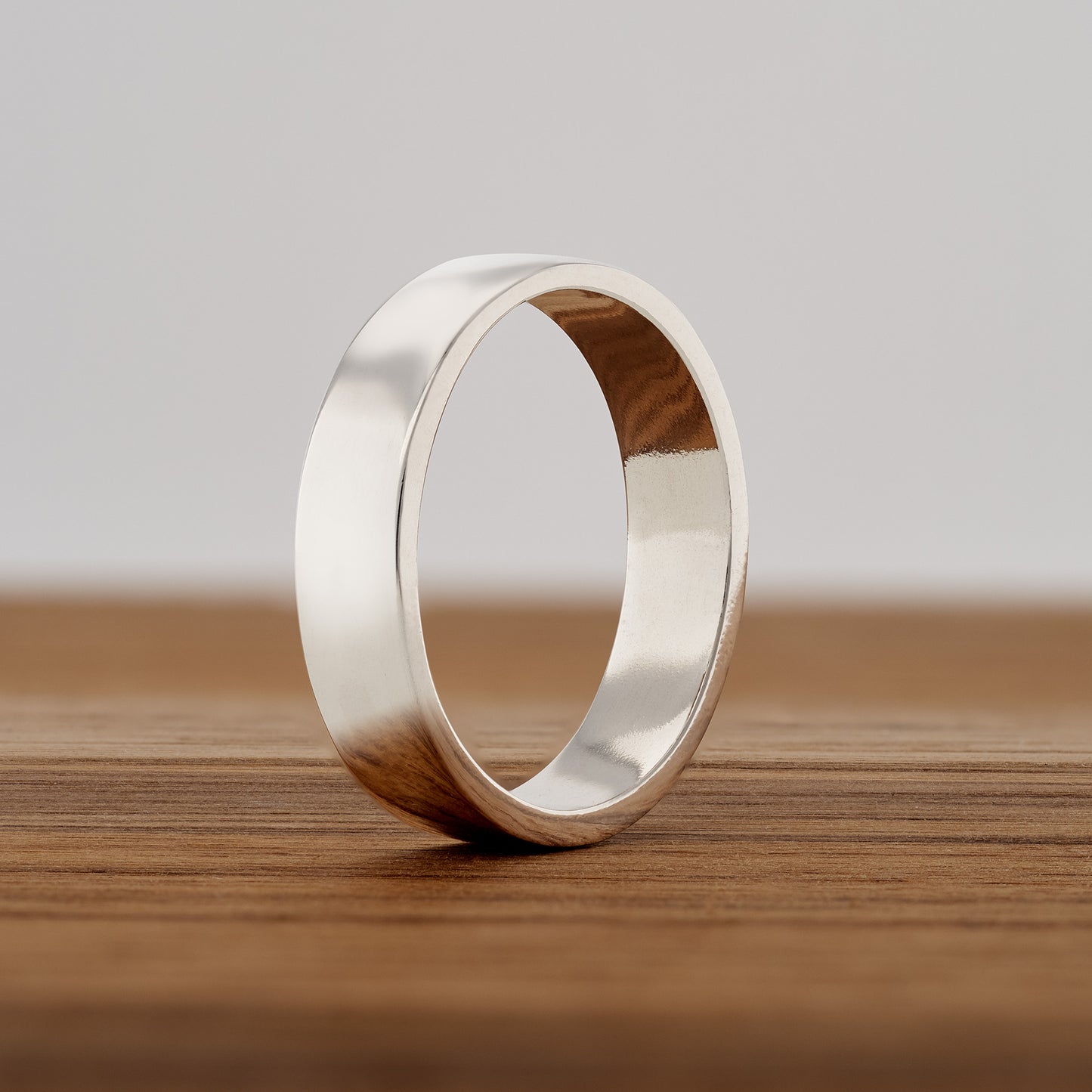 Premium Sterling Silver Band.  Great as a wedding band substitute when traveling.  5mm wide, polished DeOx sterling silver.