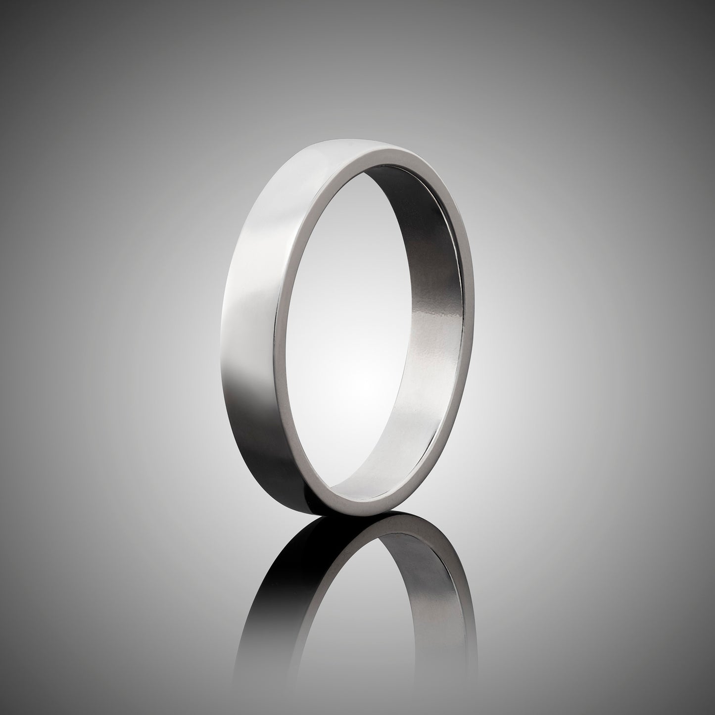 Premium Sterling Silver Band.  Great as a wedding band substitute when traveling.  4mm wide, polished DeOx sterling silver.