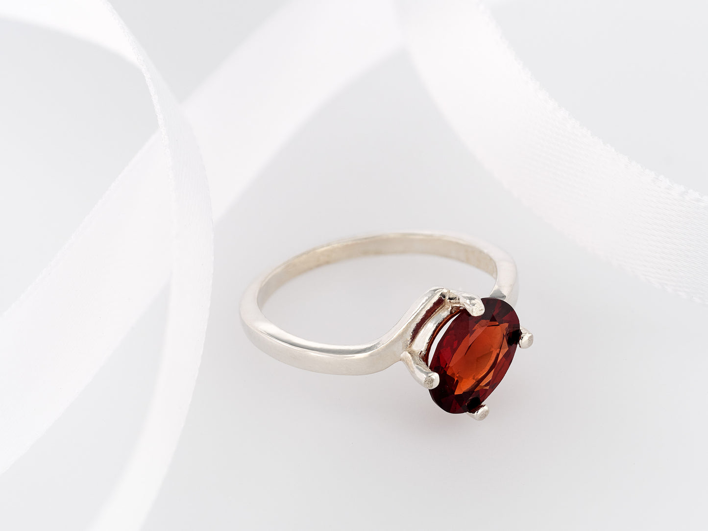 Gorgeous Almandine Garnet Ring. Sterling Silver, Oval Faceted, 8x6mm. Moderate to dark Red. Offset style, premium silver.