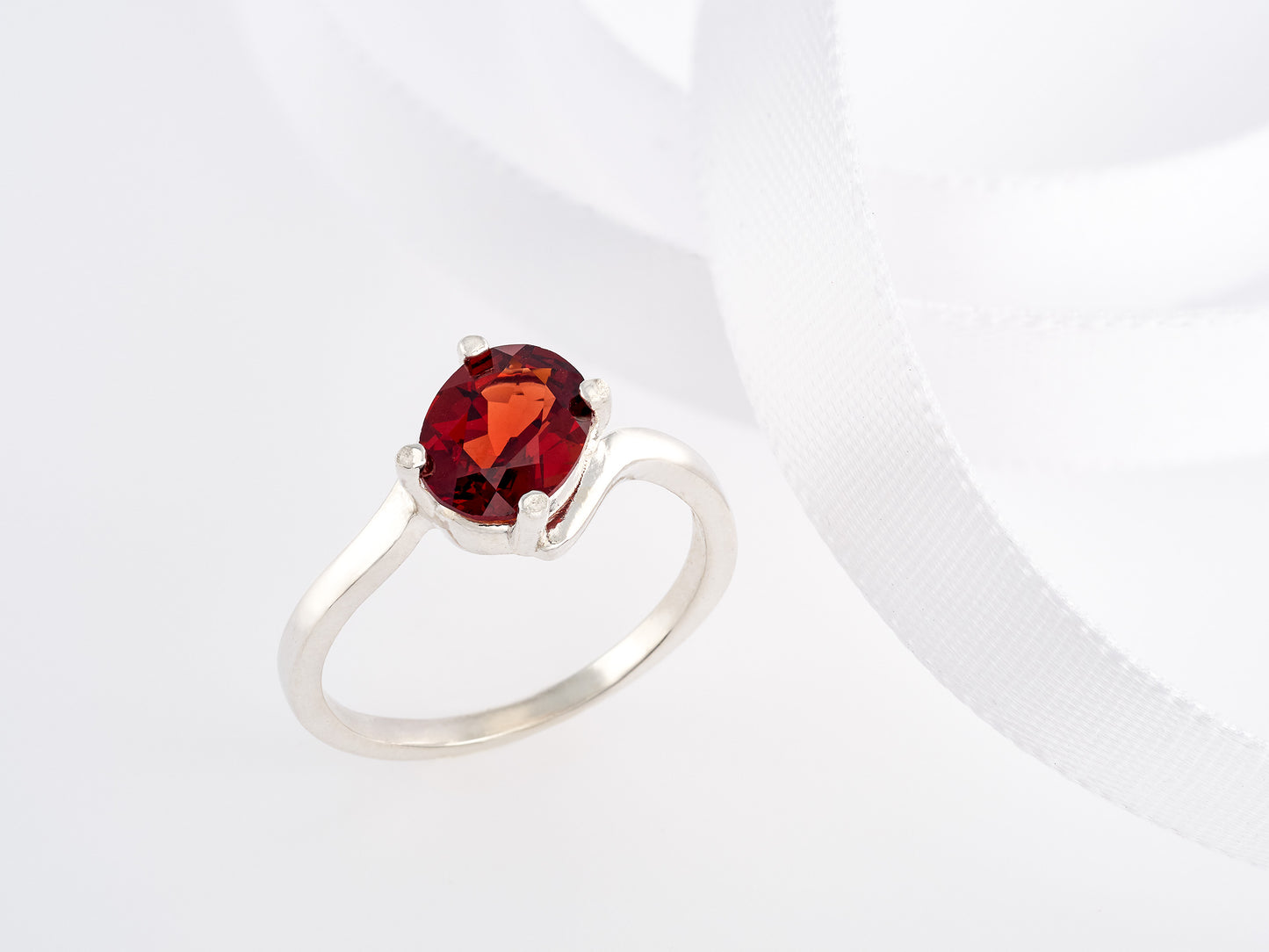 Gorgeous Almandine Garnet Ring. Sterling Silver, Oval Faceted, 8x6mm. Moderate to dark Red. Offset style, premium silver.