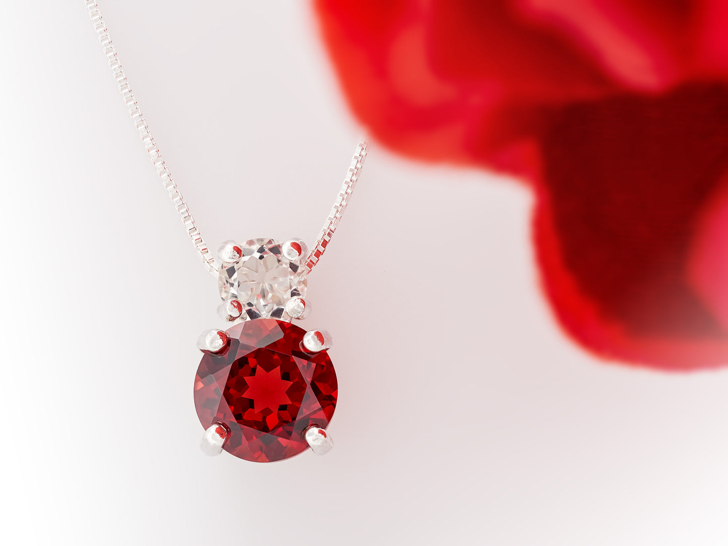 Natural red garnet and Brazilian white topaz pendant necklace. 8mm and 5mm round, faceted, gemstones.