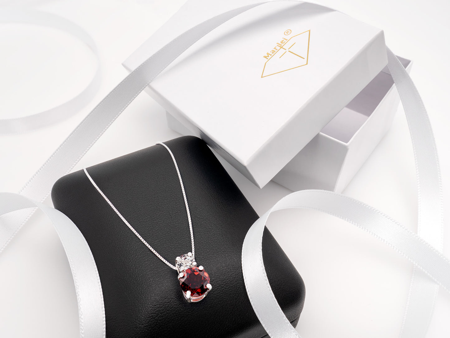 Natural red garnet and Brazilian white topaz pendant necklace. 8mm and 5mm round, faceted, gemstones.