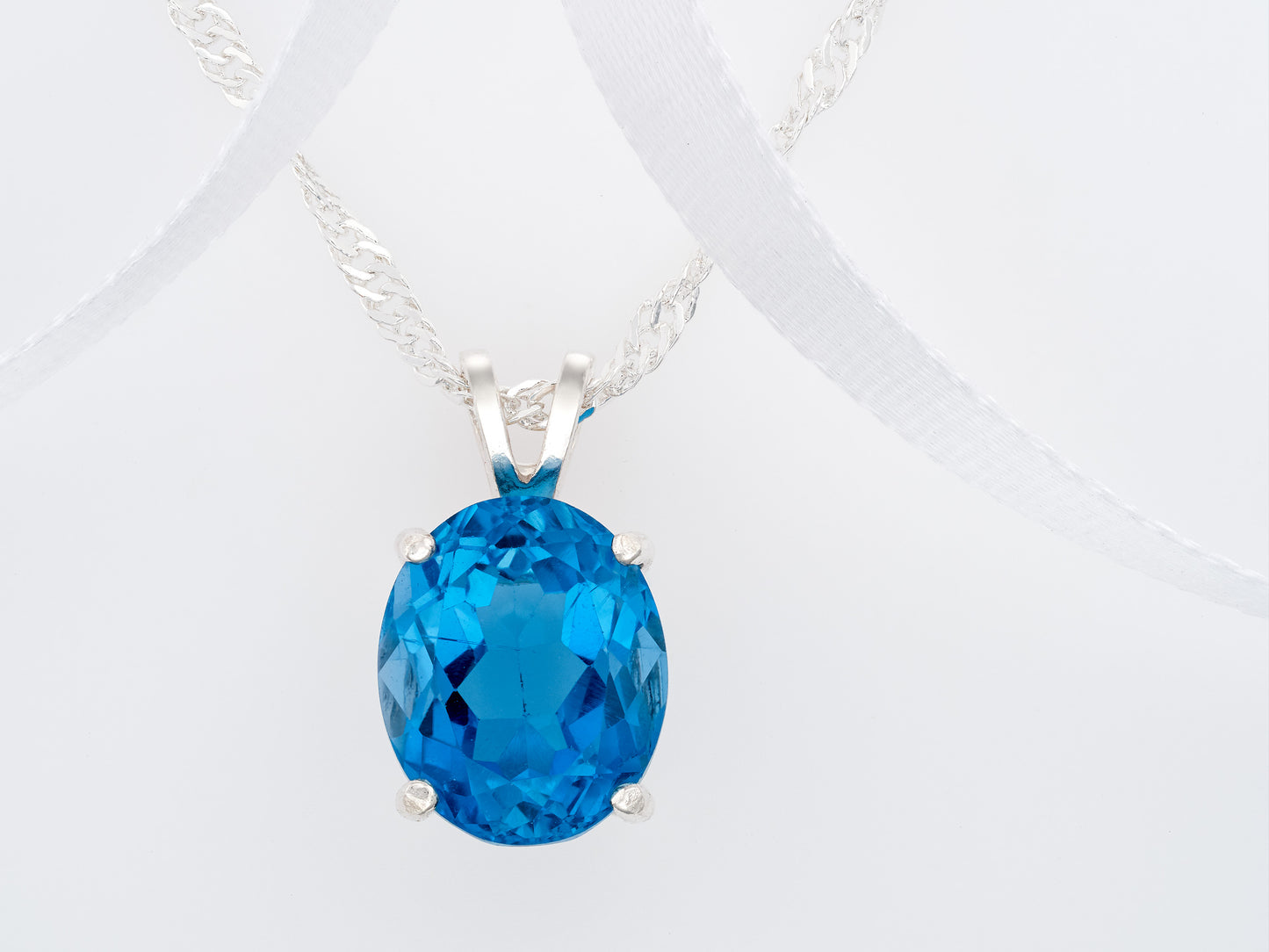 Classic Rich London Blue Topaz necklace. 11x9mm Oval, faceted, natural Brazilian Topaz. Sterling Silver.