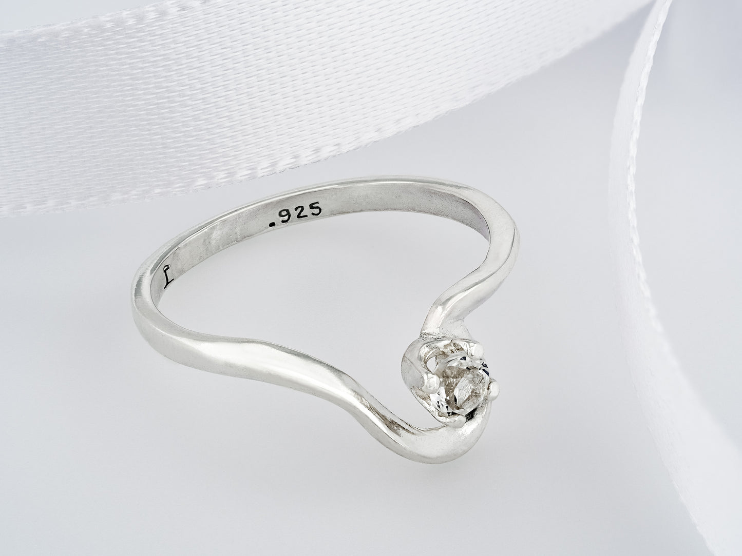 April birthstone, petite half heart style silver ring. 3mm round faceted White Topaz as the diamond alternative.