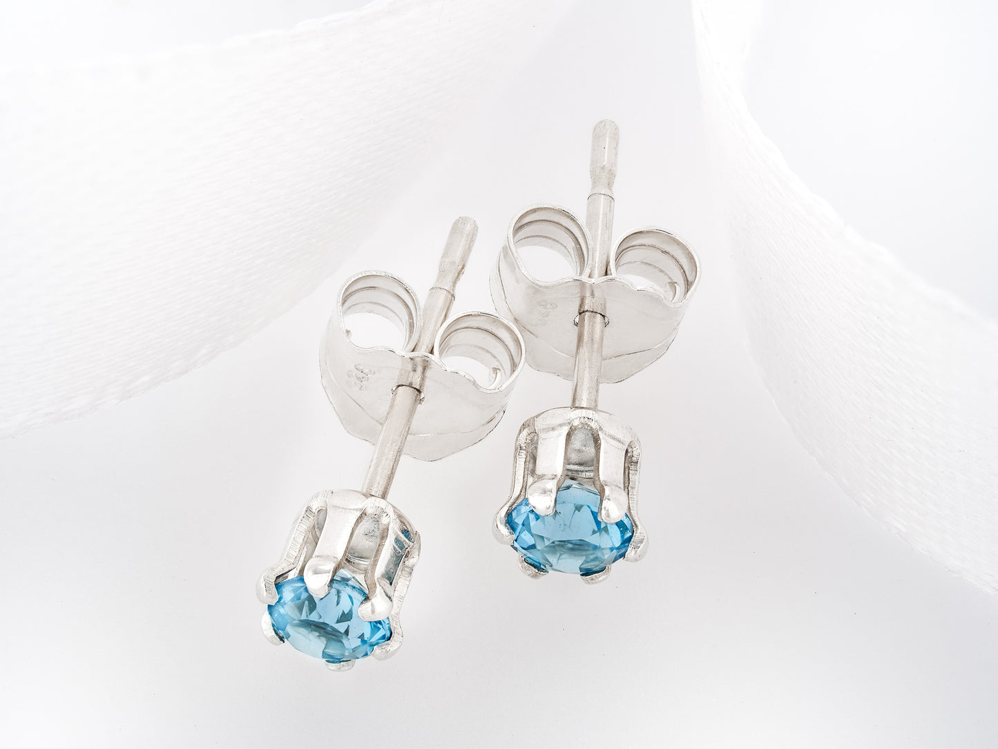 Wonderful Swiss Blue Topaz Earrings - 3mm Diamond Cut. Bright Gemstones. Sterling Silver, 6-Prong Studs.