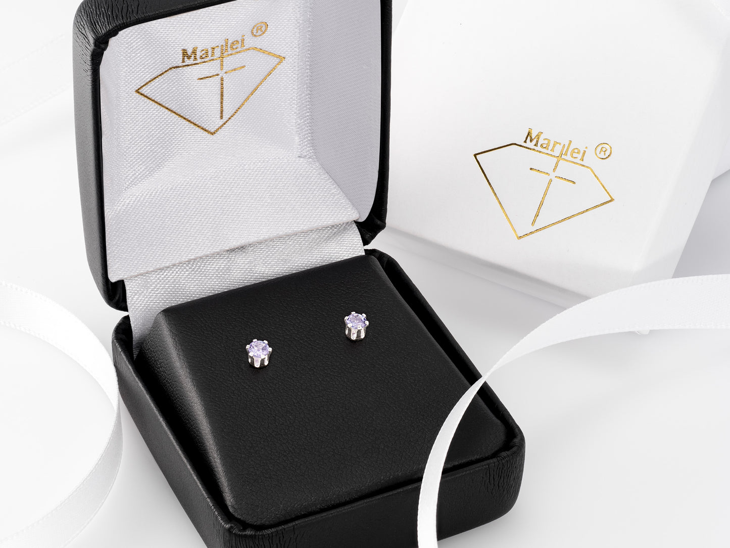 Tanzanite Earrings - 3mm Diamond Cut. Violet to Light Purple Color. Sterling Silver, 6-Prong Studs.