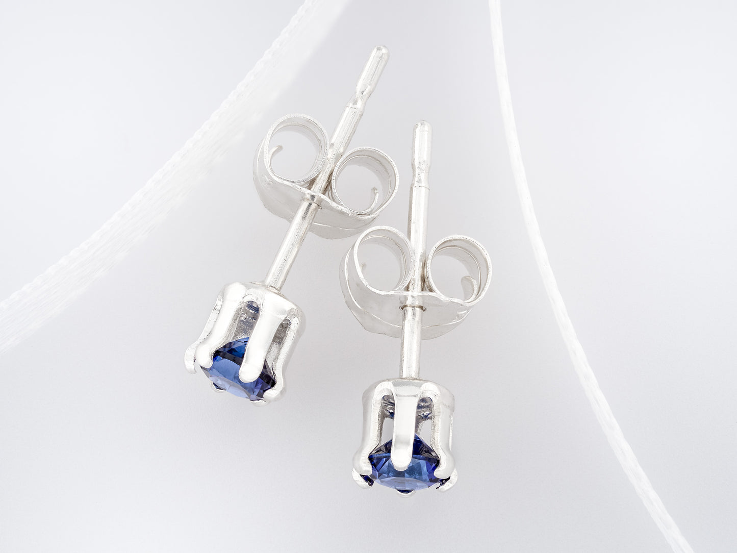 Velvety medium Blue Sapphire Earrings. 3mm round Chatham gemstones. 6-prong sterling silver studs.