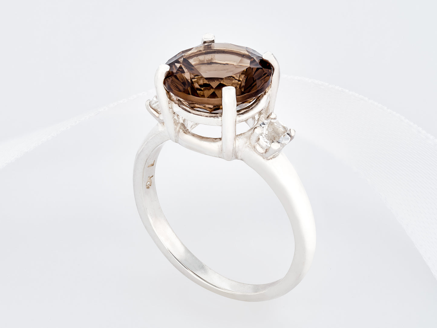 Concave Cut Smoky Quartz Ring. 10mm round, rich brown. Cut to perfection, Grade AAA. 2 x 3mm White Topaz Accents. Premium Silver.