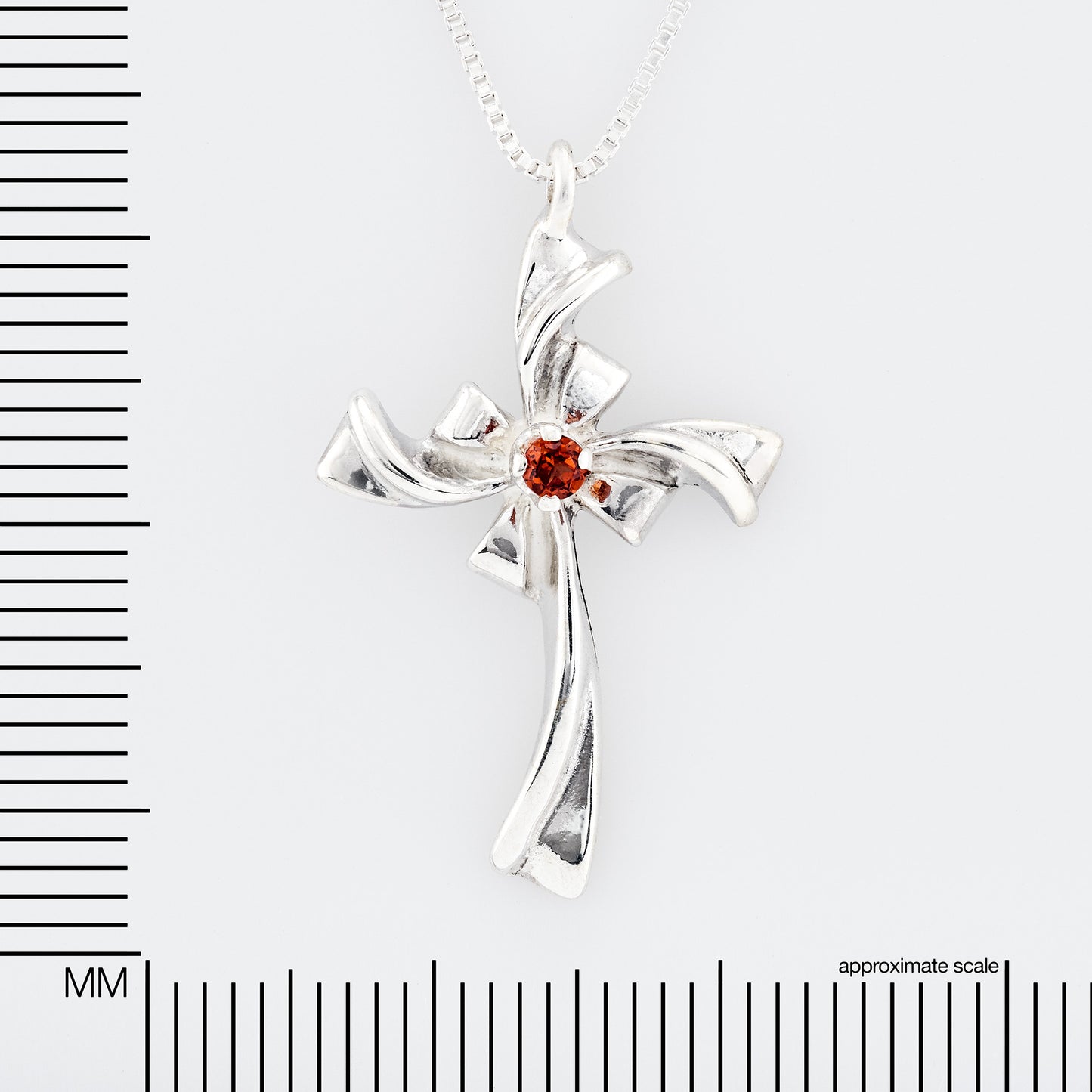 Red Garnet Silver Ribbon Cross Necklace. Handmade, sterling silver pendant with a natural, round faceted, garnet gem.