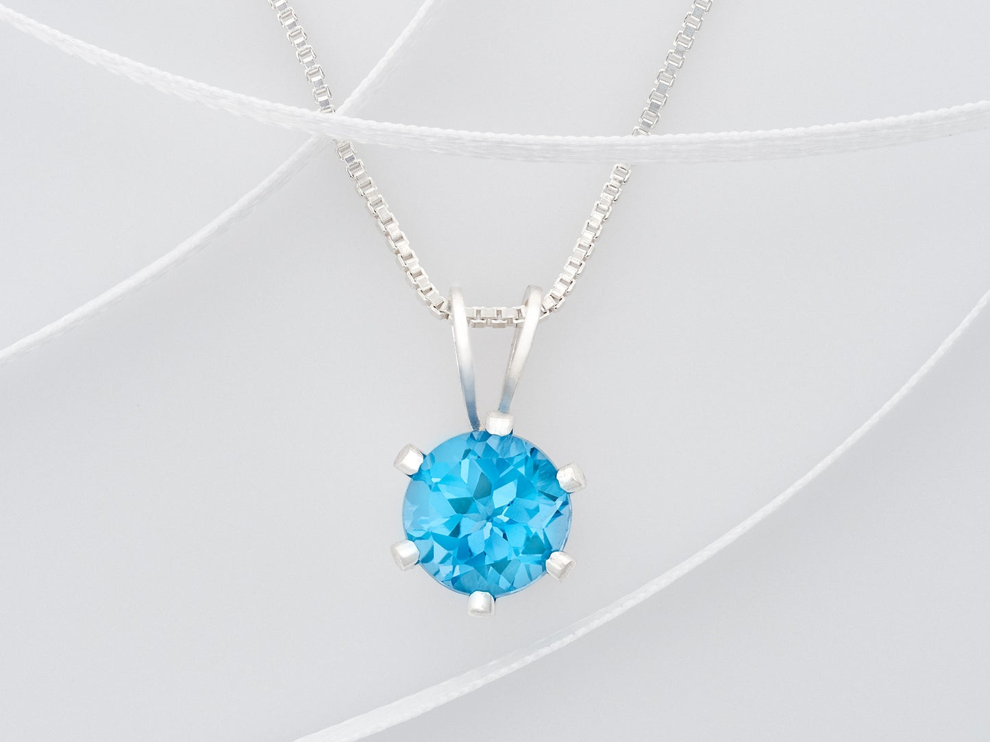 Vivid Swiss Blue Topaz Necklace. Round, 6mm, Natural Brazilian Gemstone in a 6-Prong, Sterling Silver Pendant. Great clarity and sparkle!