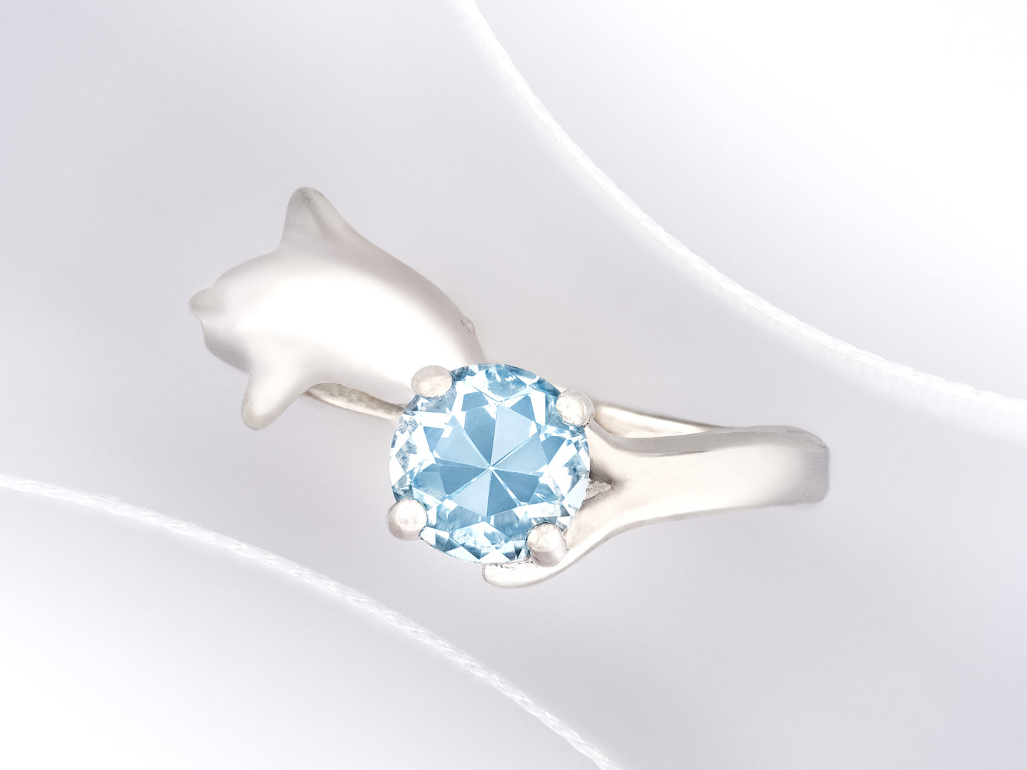 Blue topaz Dolphin ring. Natural, 6mm sky blue Topaz gemstone set in handmade premium silver ring.