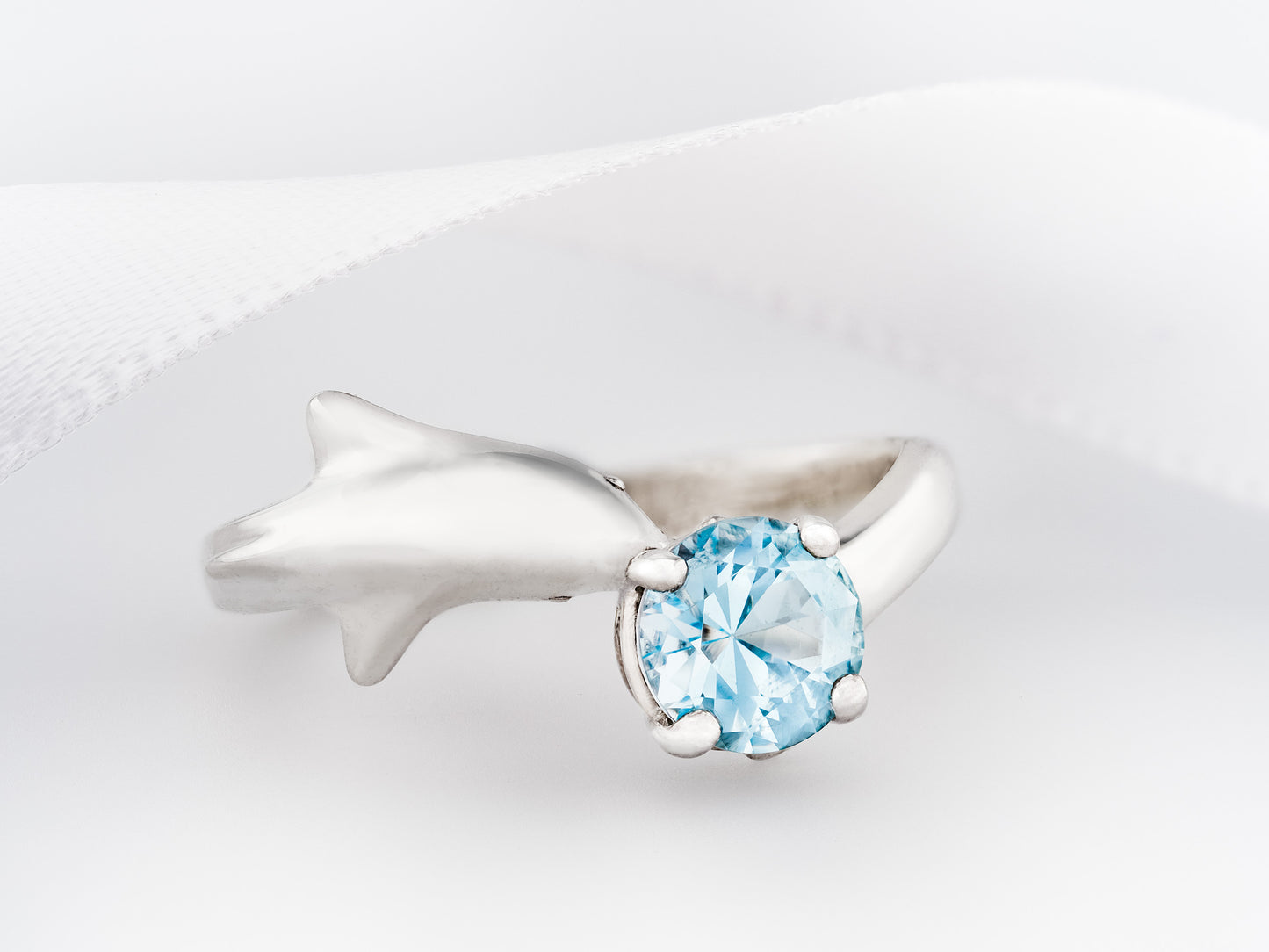 Blue topaz Dolphin ring. Natural, 6mm sky blue Topaz gemstone set in handmade premium silver ring.