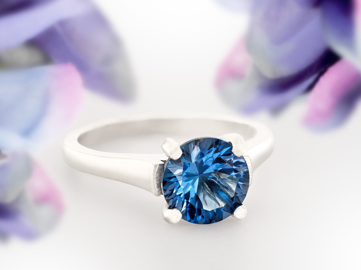 Deep Blue Topaz Ring. London Blue Color. Genuine, Brazilian London Blue Topaz Cathedral Ring. 8mm, 2.41ctw. Sterling Silver.