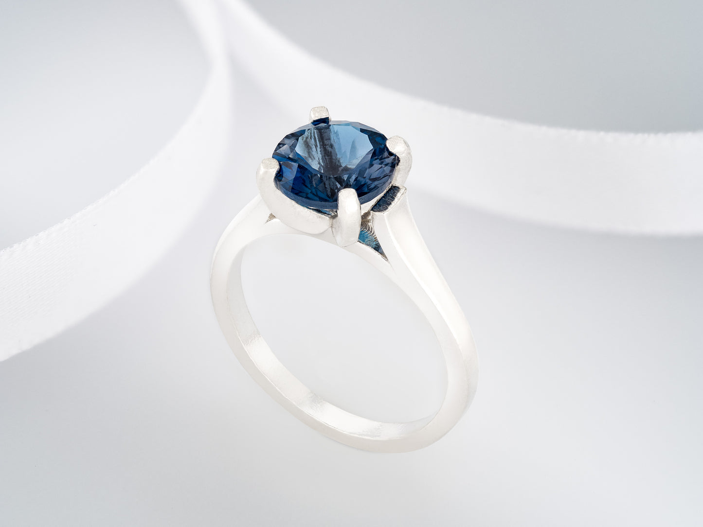 Deep Blue Topaz Ring. London Blue Color. Genuine, Brazilian London Blue Topaz Cathedral Ring. 8mm, 2.41ctw. Sterling Silver.