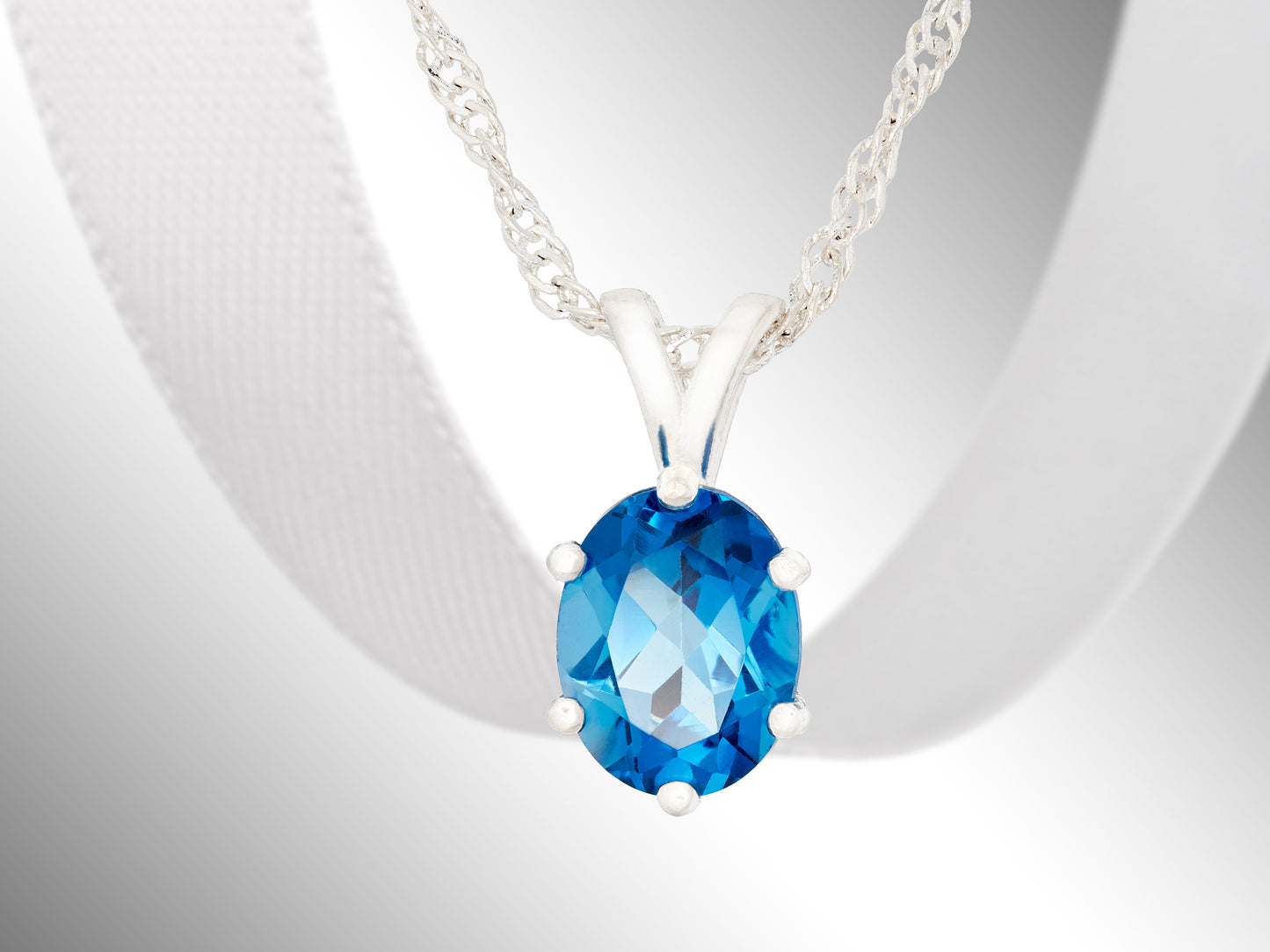 Gorgeous London Blue Topaz necklace. 9x7mm Oval, faceted, natural Brazilian Topaz. Sterling Silver.