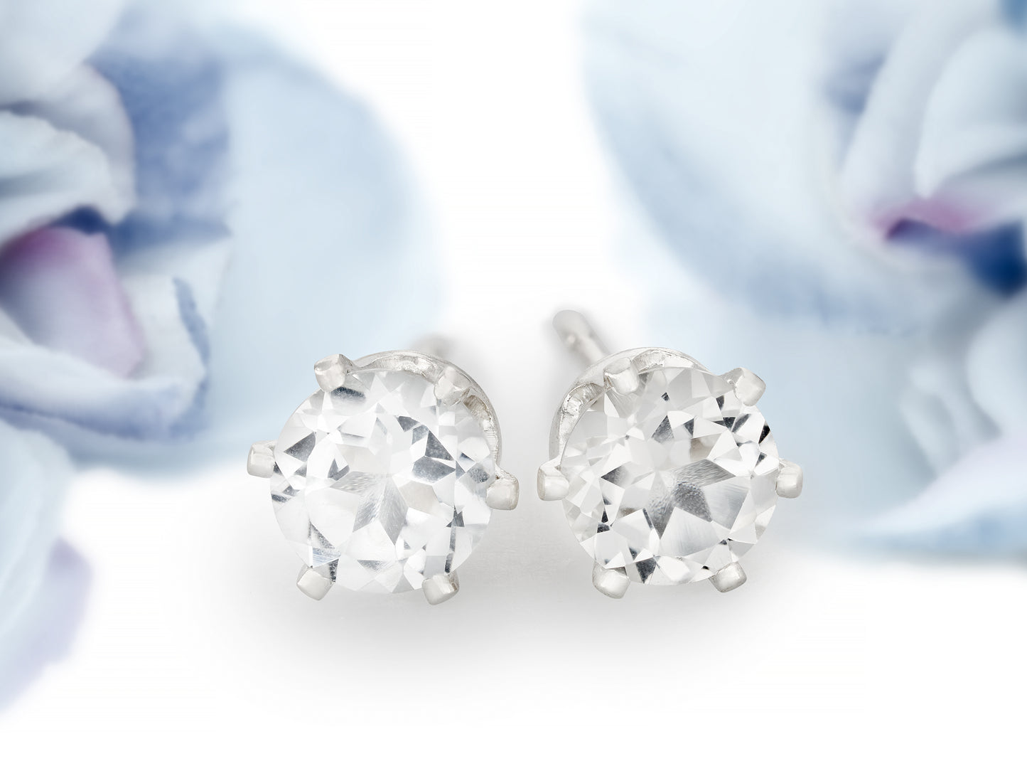 Striking, Natural, White Brazilian Topaz, Diamond Cut, 5mm Earrings.  6-Prong silver setting.