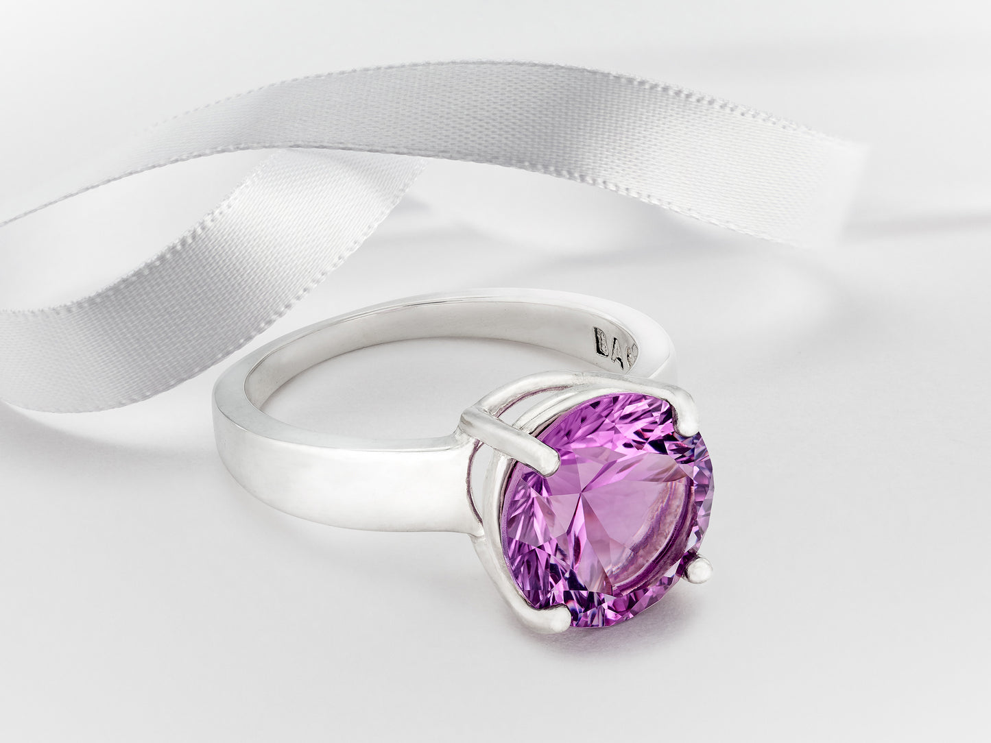 Special Edition Brazilian Amethyst ring.  Grade AAA, natural concave cut round gemstone set in premium silver. IF Clarity, 3.4ctw.