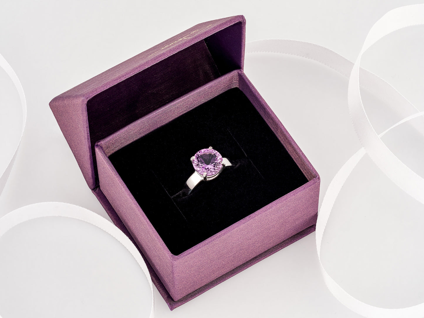 Special Edition Brazilian Amethyst ring.  Grade AAA, natural concave cut round gemstone set in premium silver. IF Clarity, 3.4ctw.