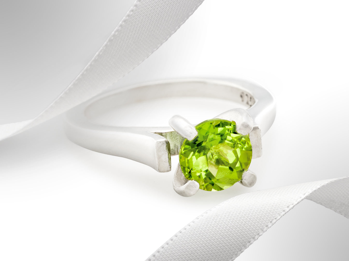 Striking Cathedral Ring featuring a brilliant 7mm round Peridot.  Sparkling August gemstone solitaire ring.