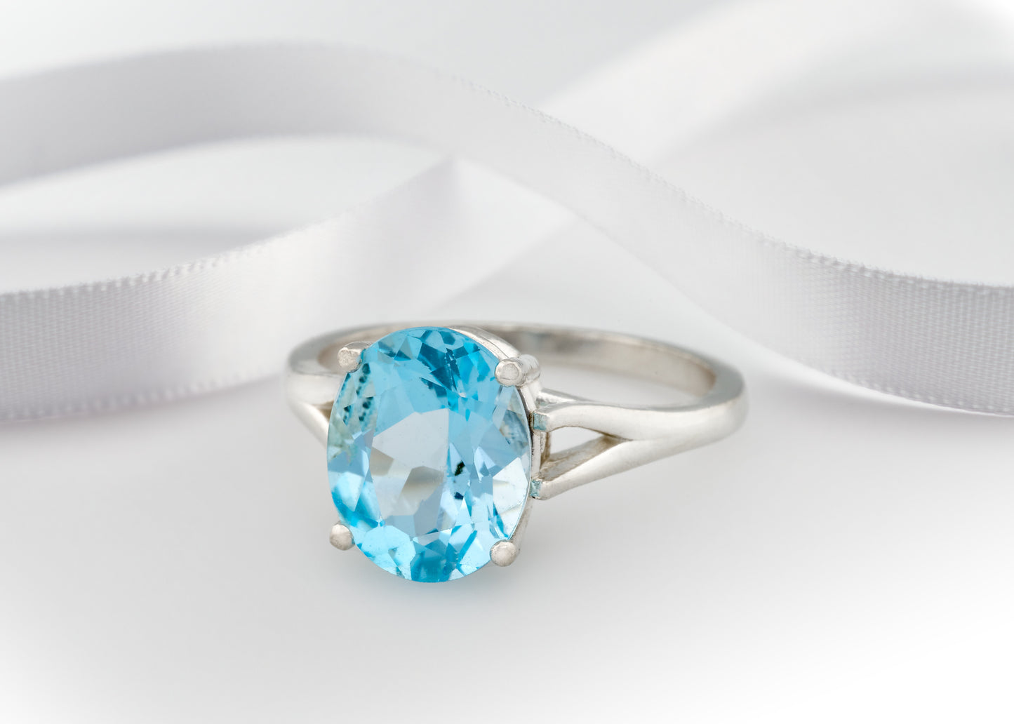 Fine Grade Sky Blue Topaz Ring in silver. Beautiful Color! Wonderful cut and clarity. Genuine Brazilian Gemstone! 11x9mm Oval, 4+ ctw.