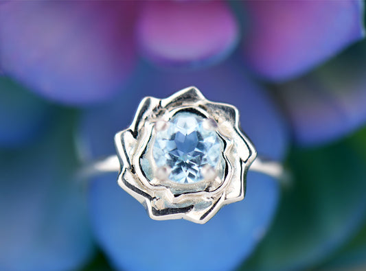 Sky Blue Lotus Flower Ring. Natural, 5mm Light Blue Topaz gemstone set in handmade premium silver ring.