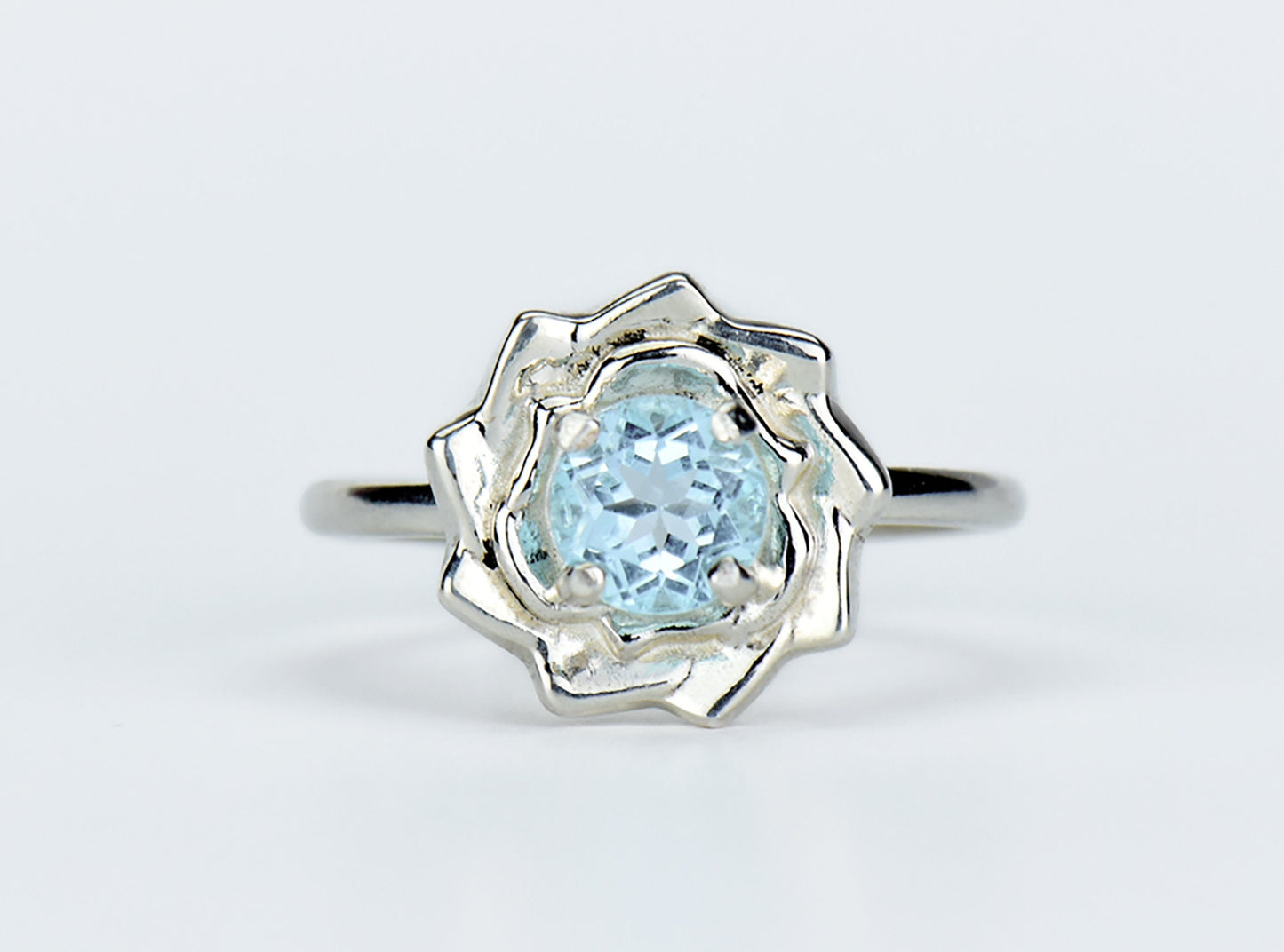 Sky Blue Lotus Flower Ring. Natural, 5mm Light Blue Topaz gemstone set in handmade premium silver ring.