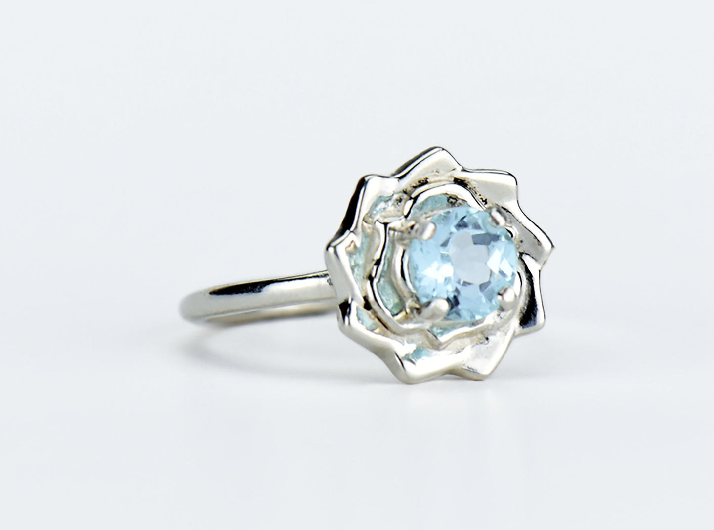 Sky Blue Lotus Flower Ring. Natural, 5mm Light Blue Topaz gemstone set in handmade premium silver ring.