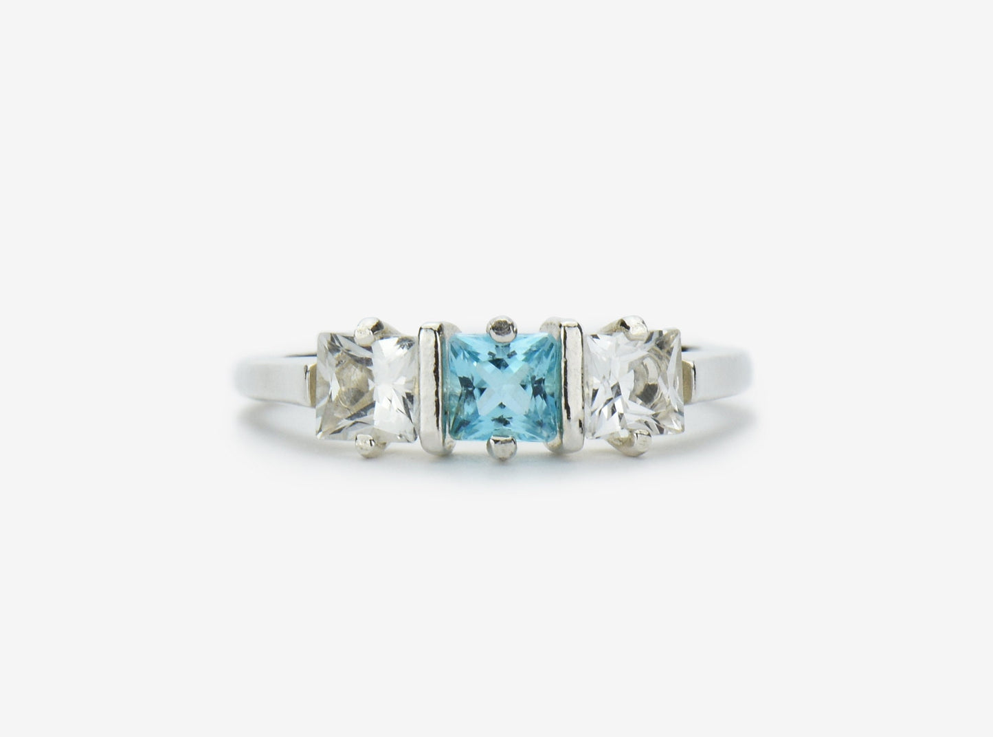 Genuine Brazilian Topaz Ring. 4x4mm Princess Cut gemstones. Swiss Blue Centerpiece with White Topaz Accents. Premium Sterling Silver.