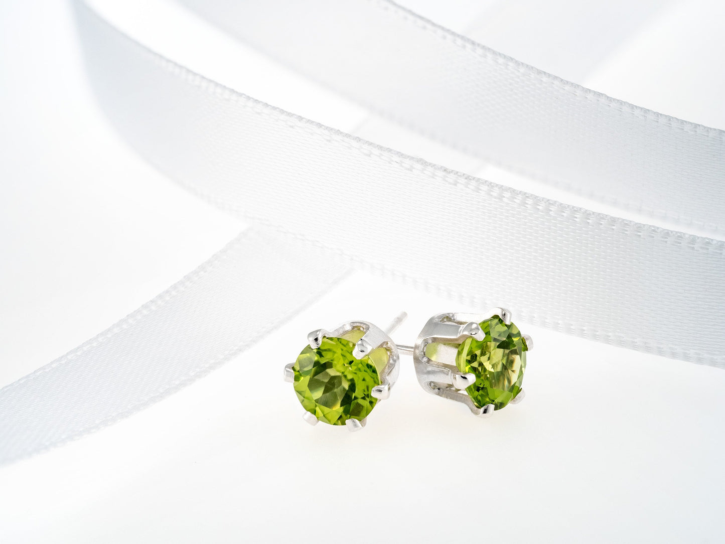 Striking Green Peridot Earrings.  6mm Round, Faceted.  Sterling Silver Earrings with Butterfly and Bullet Backs.