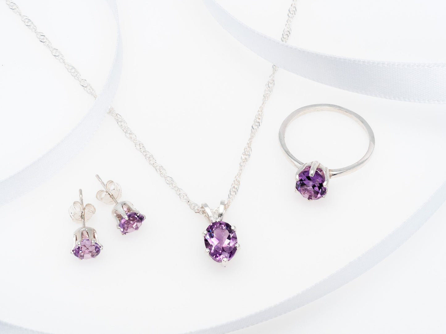 The Brazilian Amethyst Collection.  Set includes all pieces (Ring, Necklace, Earrings) at a discount. Limited time only to purchase set.