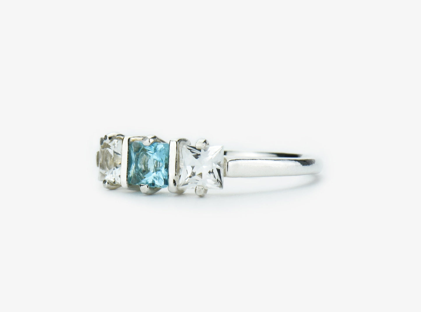 Genuine Brazilian Topaz Ring. 4x4mm Princess Cut gemstones. Swiss Blue Centerpiece with White Topaz Accents. Premium Sterling Silver.