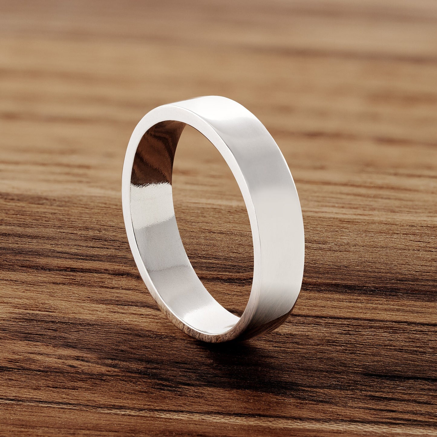 Premium Sterling Silver Band.  Great as a wedding band substitute when traveling.  5mm wide, polished DeOx sterling silver.