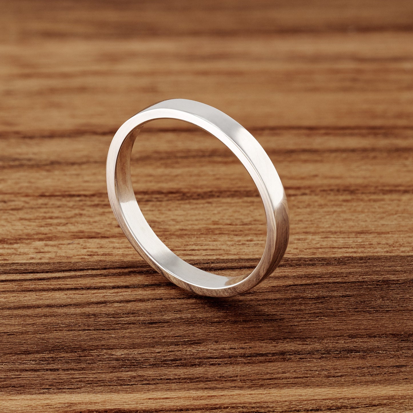 Premium Sterling Silver Band.  Great as a wedding band substitute when traveling.  3mm wide, polished DeOx sterling silver.