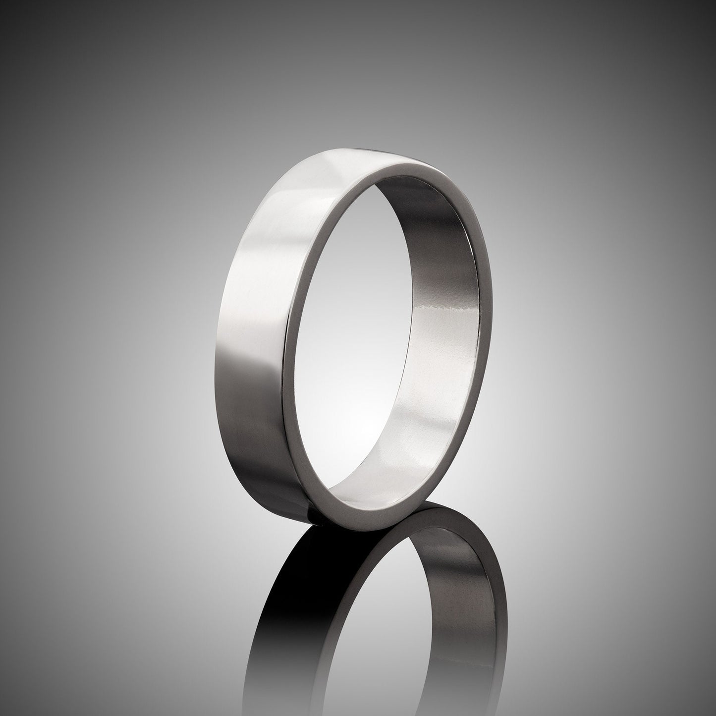 Premium Sterling Silver Band.  Great as a wedding band substitute when traveling.  5mm wide, polished DeOx sterling silver.