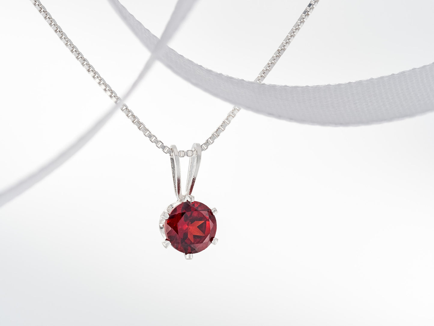 January Red, Mozambique Garnet Necklace. Round, 5mm, Gemstone in a 6-Prong, Sterling Silver Pendant.