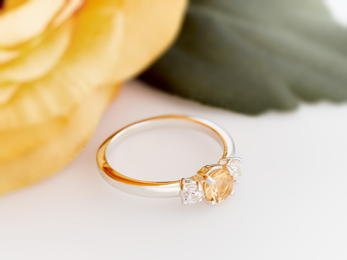 Imperial Topaz ring with white sapphire accents. Three Gem Ring featuring a 5 mm Imperial and 3 mm white sapphires.