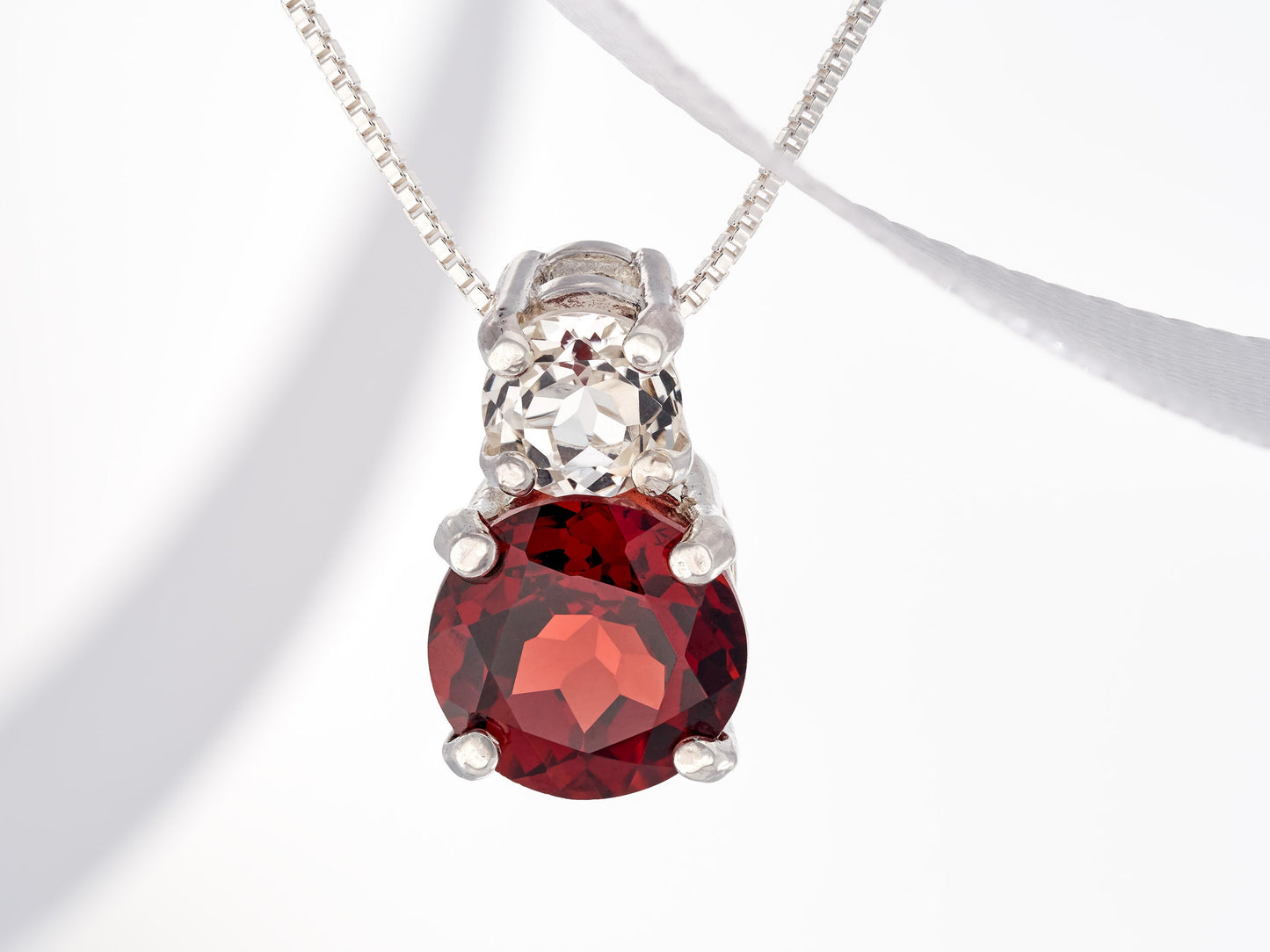 Natural red garnet and Brazilian white topaz pendant necklace. 8mm and 5mm round, faceted, gemstones.