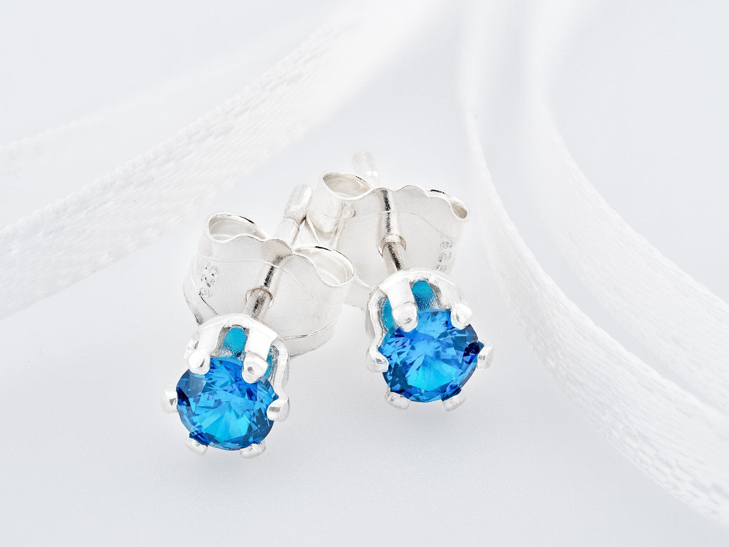 Vivid Medium Royal Blue Sapphire Earrings. 3mm Round. Chatham Gemstones. Sterling Silver, 6-Prong Classic settings.