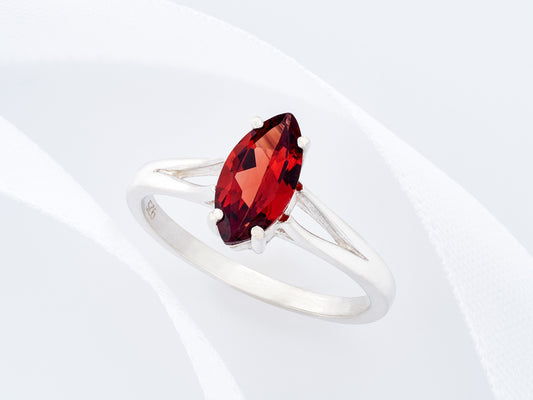 Marquise Mozambique Garnet.  Gorgeous color!  10x5mm size is perfect.  Premium Silver ring in your select size.