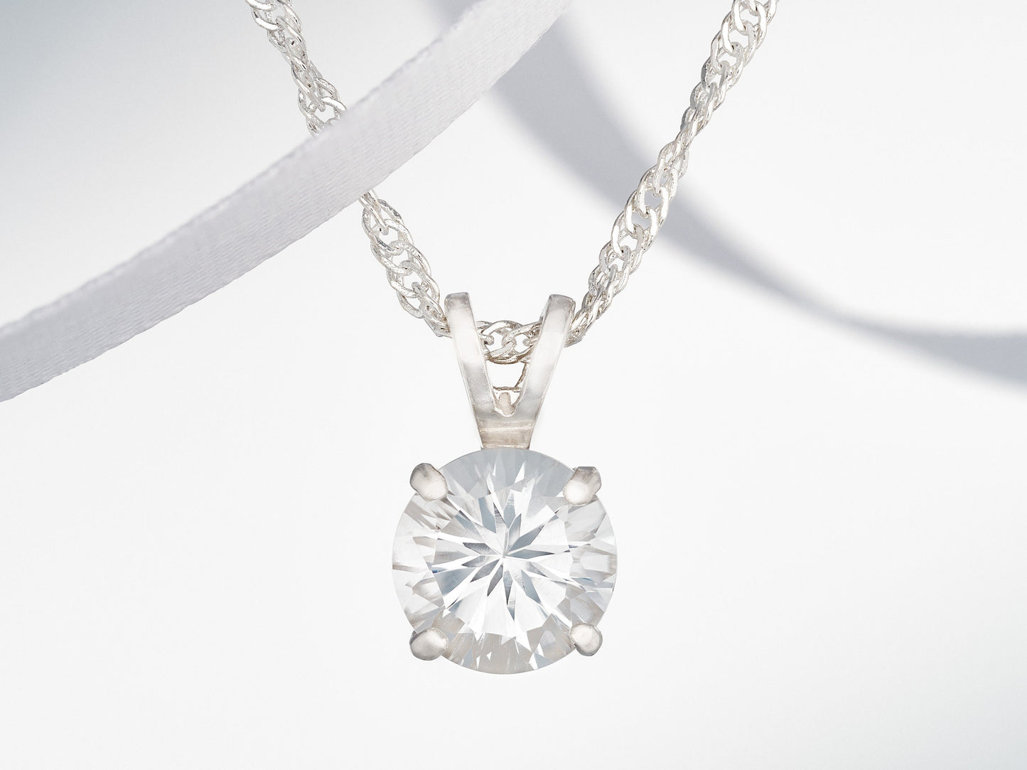 Tantalizing gemstone!  8mm Round, Concave Cut Natural White Topaz necklace from Brazil. Premium Sterling Silver, Pendant or chain.