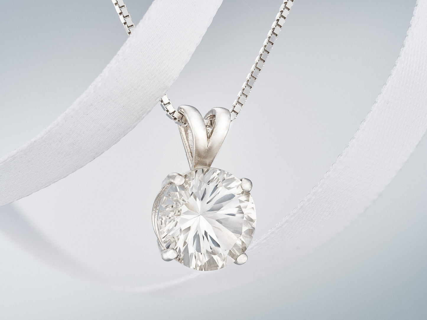 Incredible sparkle!  10mm, Round, Concave Cut Natural White Topaz necklace from Brazil. Sterling Silver