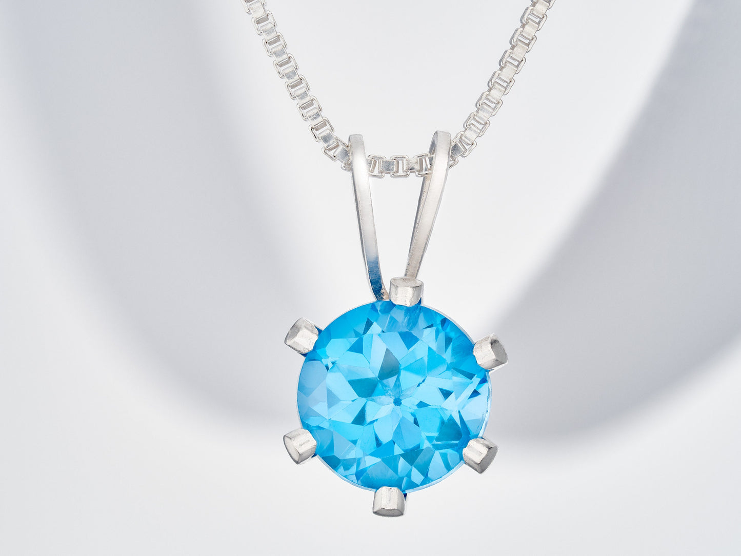 Vivid Swiss Blue Topaz Necklace. Round, 6mm, Natural Brazilian Gemstone in a 6-Prong, Sterling Silver Pendant. Great clarity and sparkle!