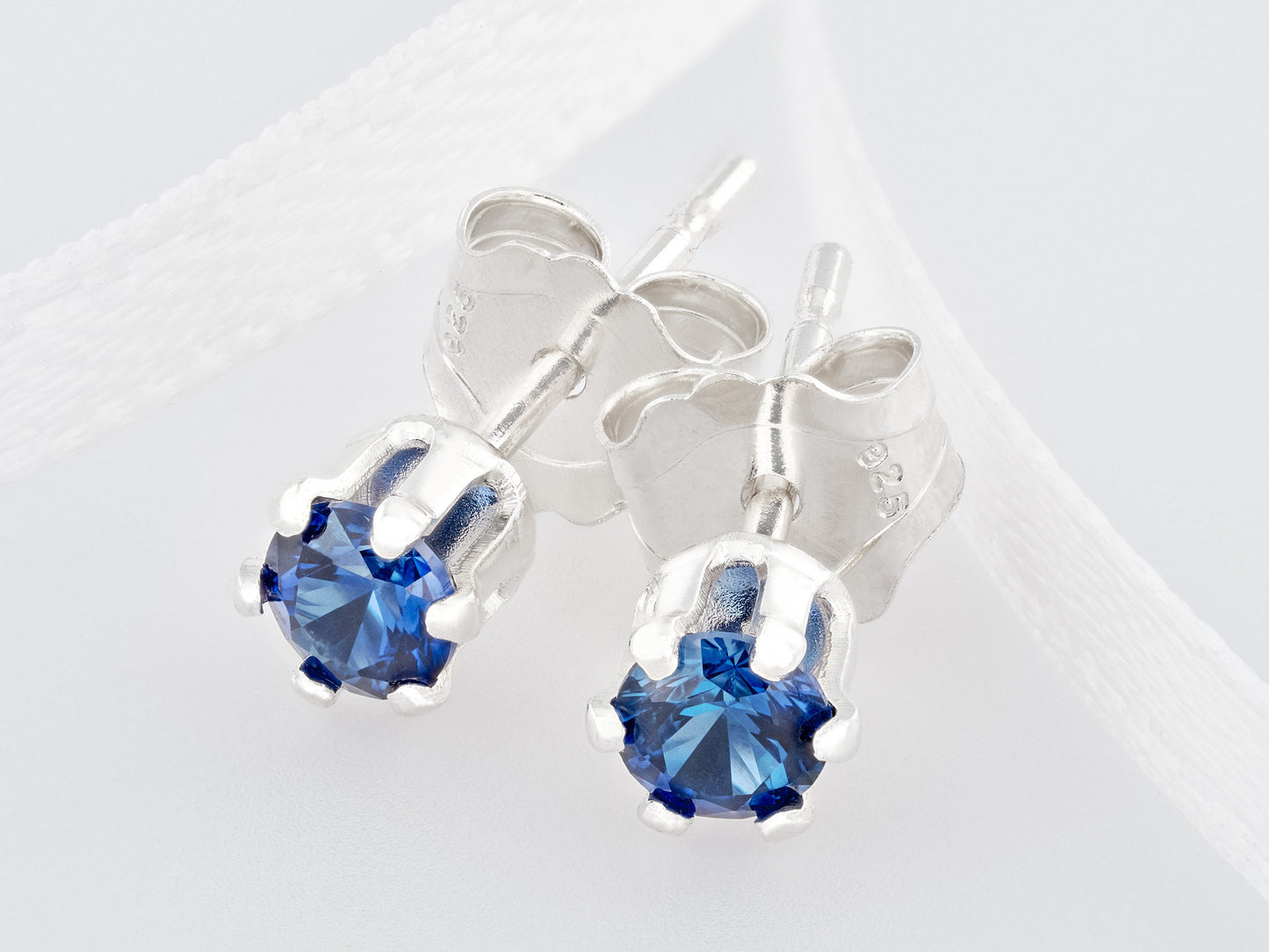 Velvety medium Blue Sapphire Earrings. 3mm round Chatham gemstones. 6-prong sterling silver studs.