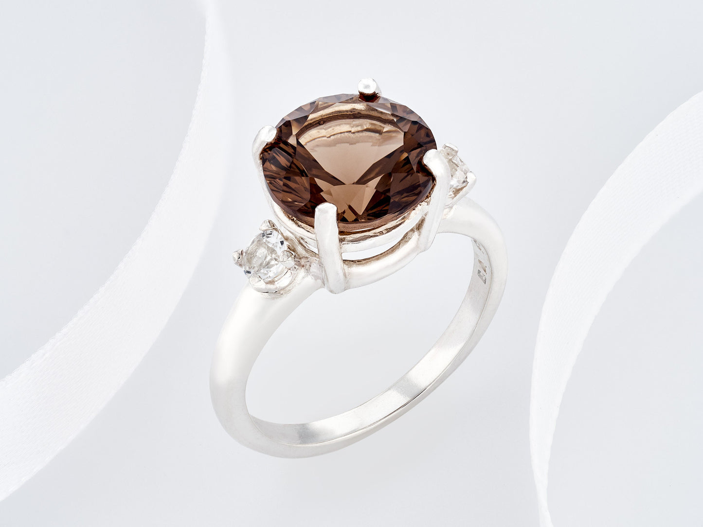 Concave Cut Smoky Quartz Ring. 10mm round, rich brown. Cut to perfection, Grade AAA. 2 x 3mm White Topaz Accents. Premium Silver.